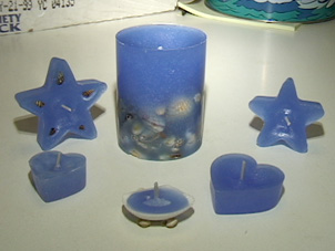 Picture of candle with embedded shells